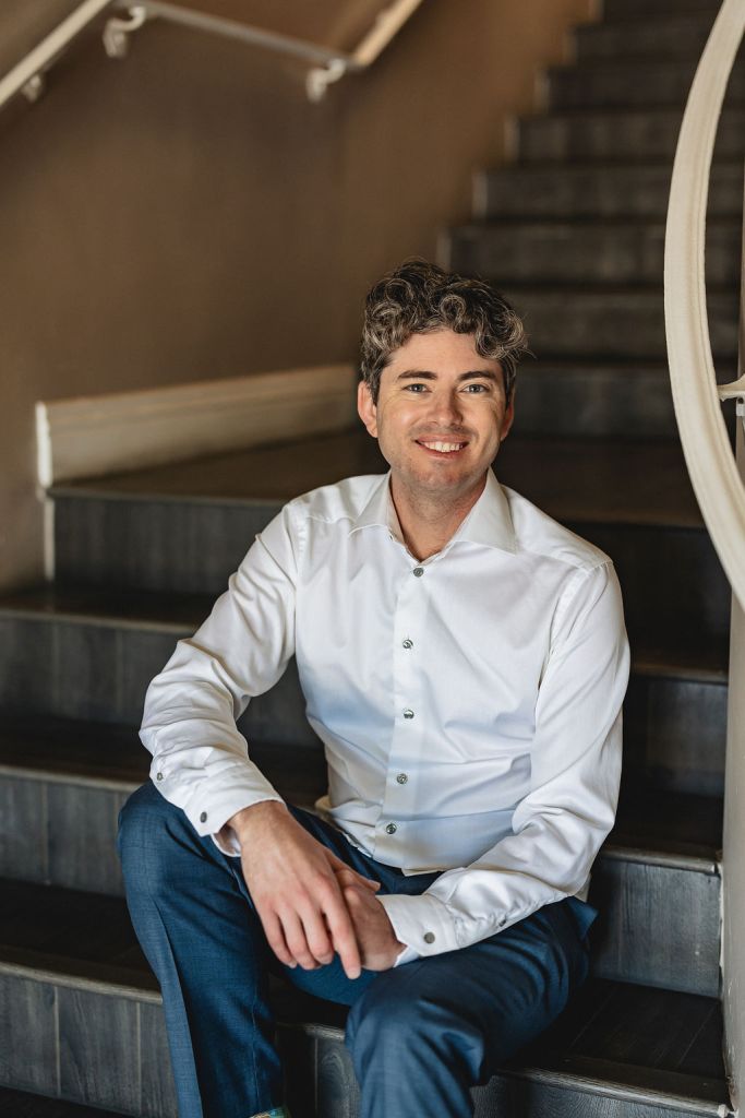 Matthew M. Pincus sitting on the stairs