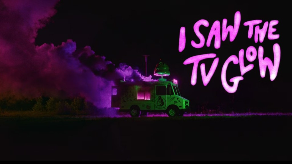 There is an ice cream truck, and out of it is coming purple smoke. The entire scene is dark except for the green color of the truck and the purple light of the title of the film, I Saw the TV Glow, in the upper right hand corner.