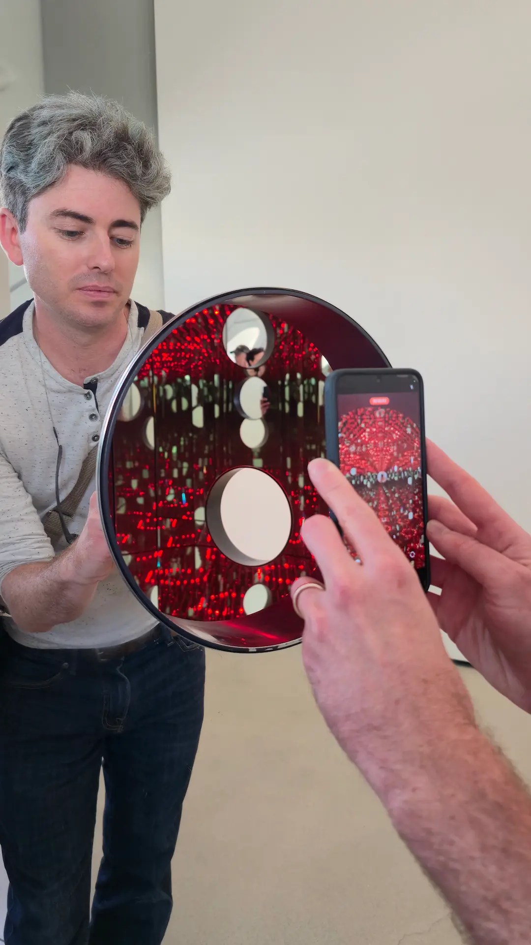 Dr. Matthew M. Pincus filming Yayoi Kusama Infinity room at The Broad in Downtown Los Angeles