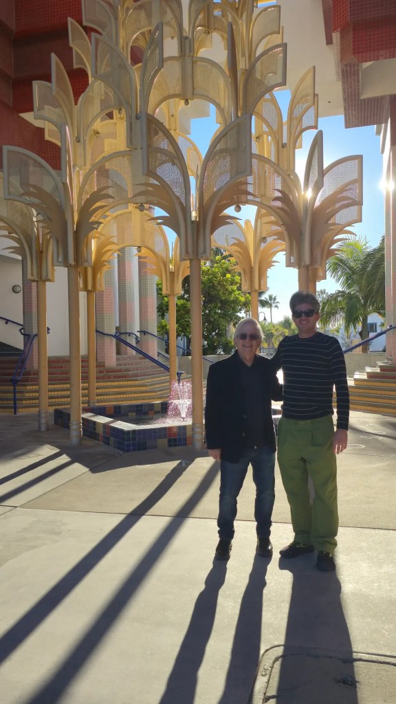 Matthew and his dad and art critic, Robert L. Pincus in Downtown Oceanside at City Hall, designed by famed architect Irving Gill.