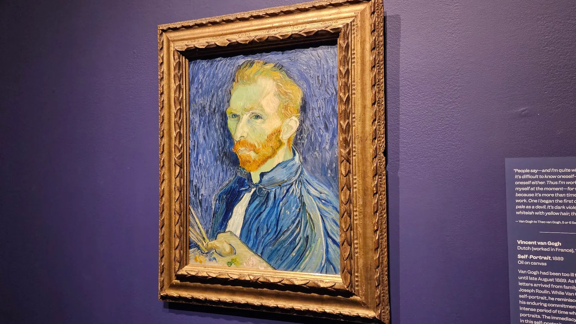 Dr. Matthew M. Pincus capturing a close-up cinematic shot of a Vincent van Gogh self-portrait, highlighting the textures and vibrant orange and blue tones.